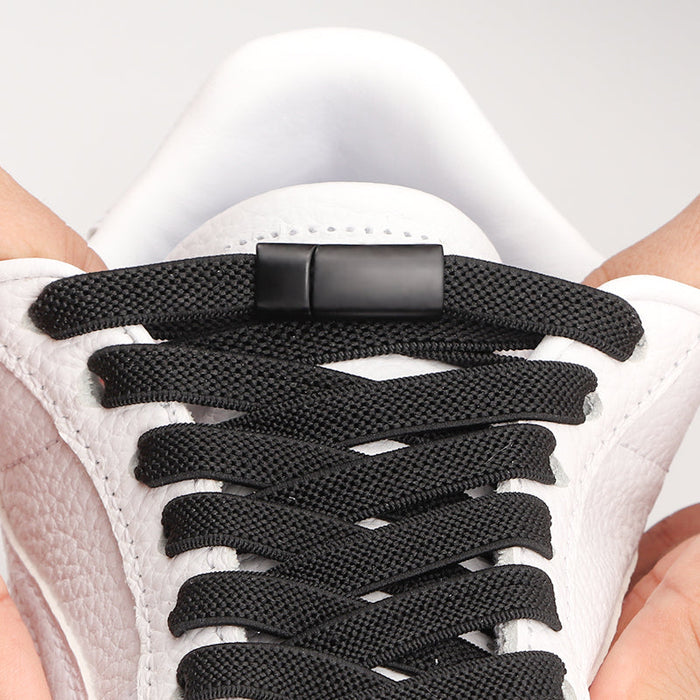 Magnetic elastic shoe laces